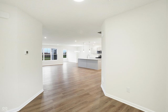 interior space with hardwood / wood-style floors