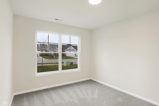 view of carpeted spare room