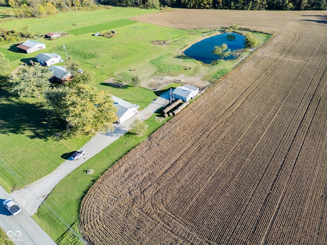 bird's eye view featuring a rural view and a water view