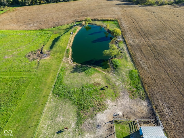 drone / aerial view featuring a water view and a rural view