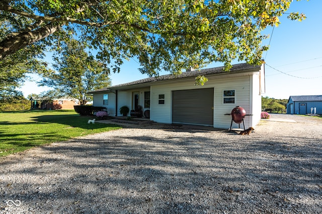 ranch-style home with a front lawn