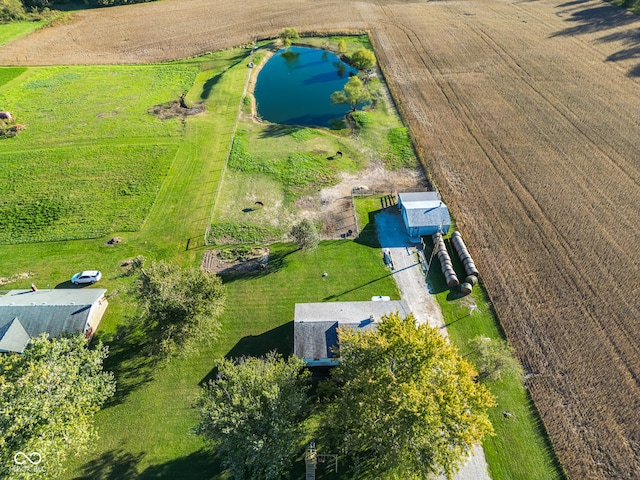 aerial view with a rural view and a water view