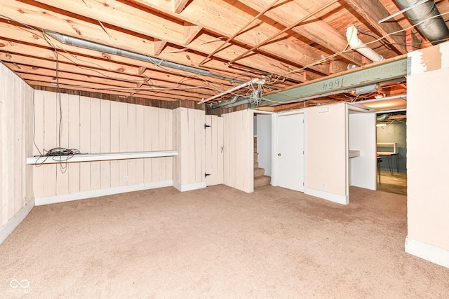 basement with light colored carpet