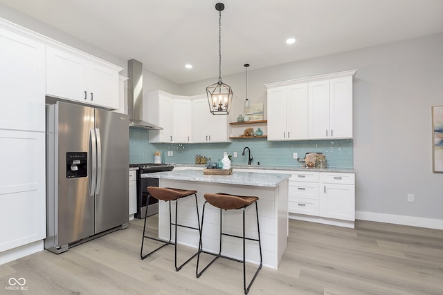 kitchen with wall chimney range hood, electric range, white cabinetry, and stainless steel refrigerator with ice dispenser