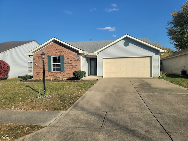 single story home with a front lawn and a garage