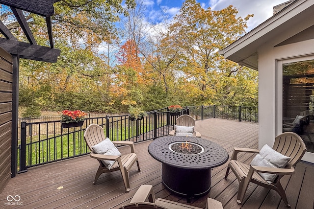 deck featuring a fire pit