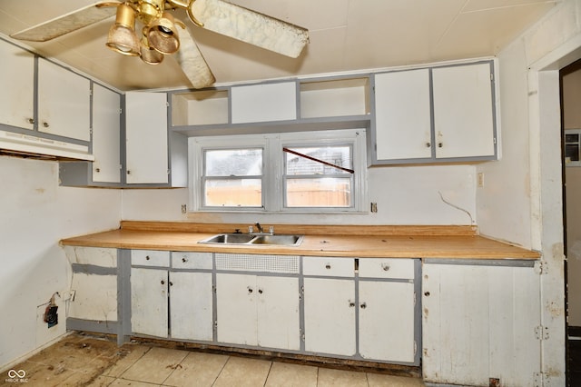 kitchen with white cabinets and sink