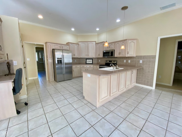 kitchen featuring kitchen peninsula, hanging light fixtures, ornamental molding, light tile patterned flooring, and stainless steel appliances