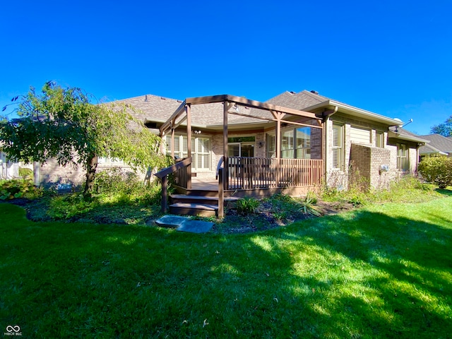 back of house with a deck and a lawn