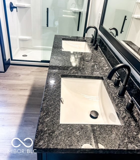 bathroom with vanity, hardwood / wood-style floors, and walk in shower