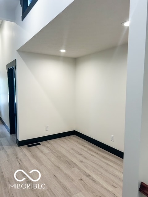 unfurnished room featuring light wood-type flooring