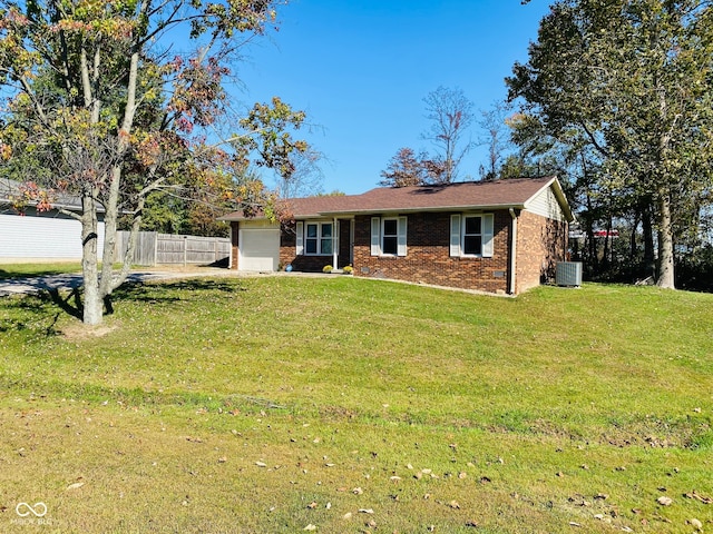 single story home with a front yard, a garage, and cooling unit