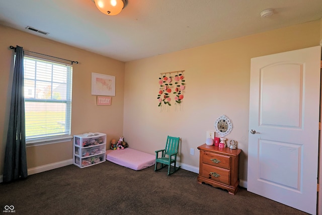 bedroom featuring dark carpet