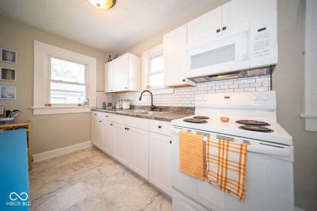 kitchen featuring white cabinets, sink, white appliances, and tasteful backsplash