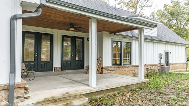 entrance to property featuring ceiling fan, french doors, and central AC