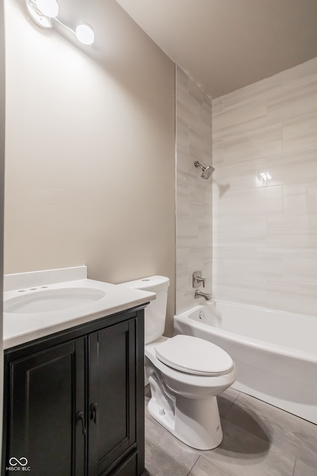 full bathroom with toilet, shower / bathing tub combination, tile patterned floors, and vanity