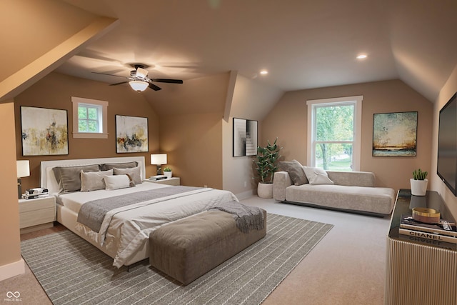 carpeted bedroom with lofted ceiling and ceiling fan