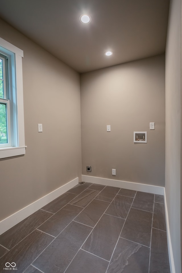 washroom with washer hookup and hookup for an electric dryer