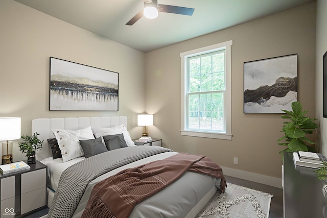 bedroom with wood-type flooring and ceiling fan