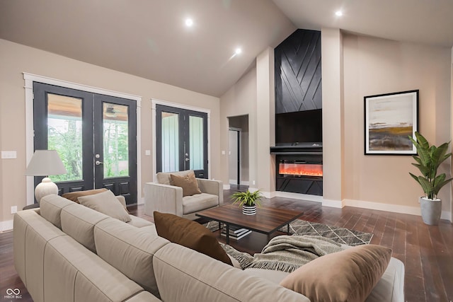 living room featuring high vaulted ceiling, french doors, and dark hardwood / wood-style flooring