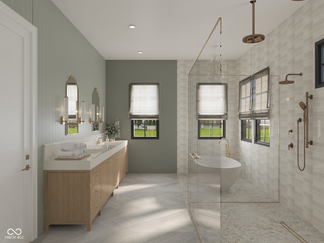 1717 Beaufain St, Carmel, IN 46032 - bathroom with tiled shower, a freestanding bath, vanity, and tile patterned flooring