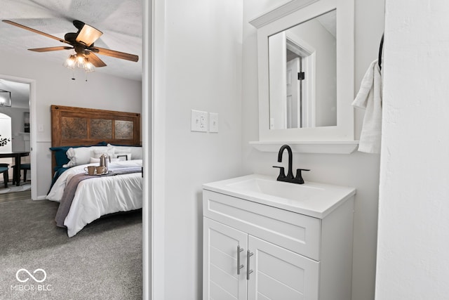 bathroom featuring vanity and ceiling fan