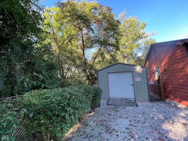 view of outbuilding with a garage