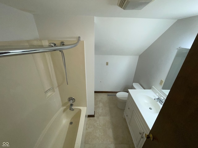 full bathroom featuring vanity, lofted ceiling, toilet, and shower / bath combination