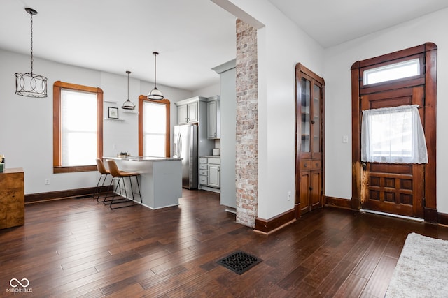 foyer featuring dark hardwood / wood-style floors