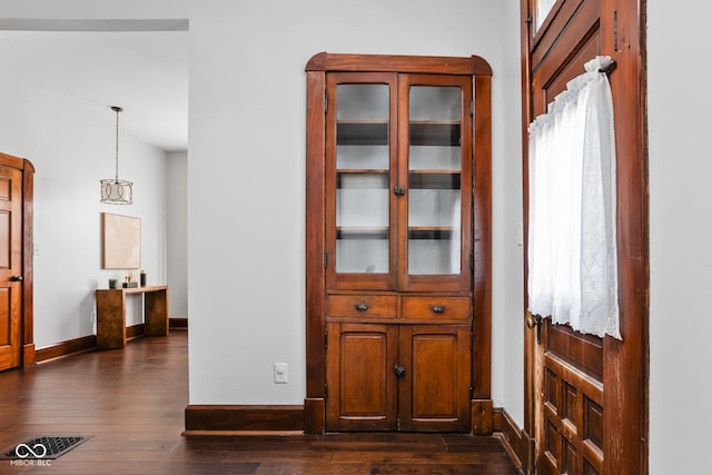 interior space featuring dark wood-type flooring