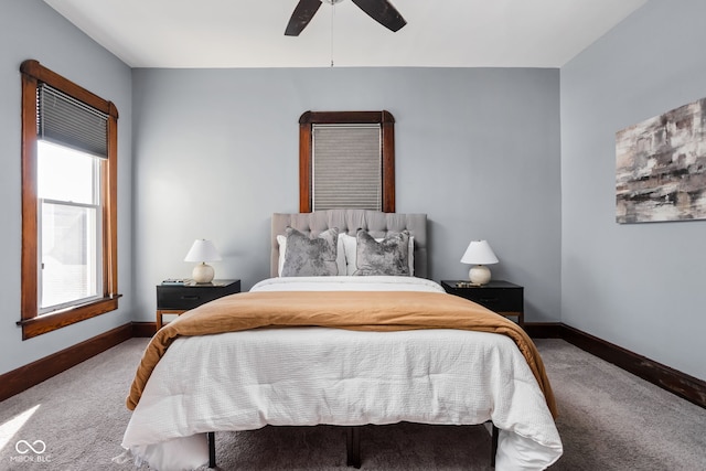 bedroom with ceiling fan and carpet