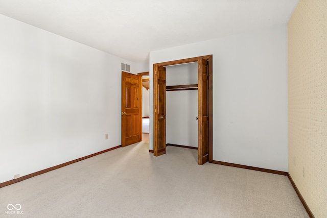 unfurnished bedroom with a closet