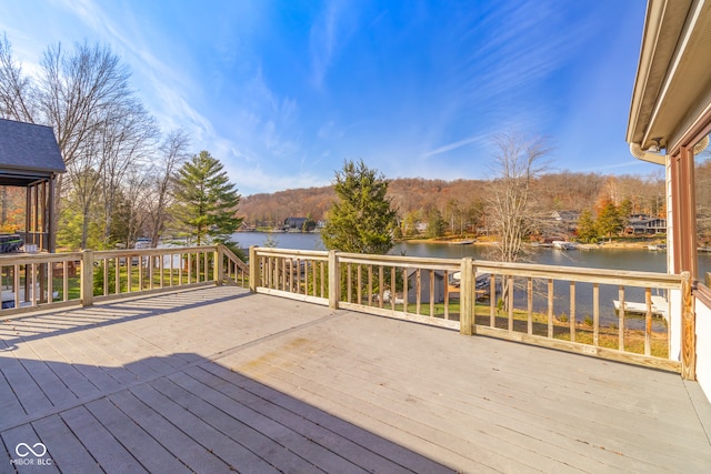 deck featuring a water view