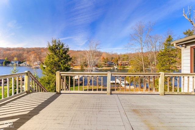 wooden terrace with a water view