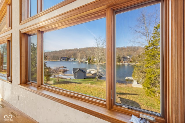 interior details featuring a water view