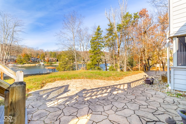 view of patio featuring a water view