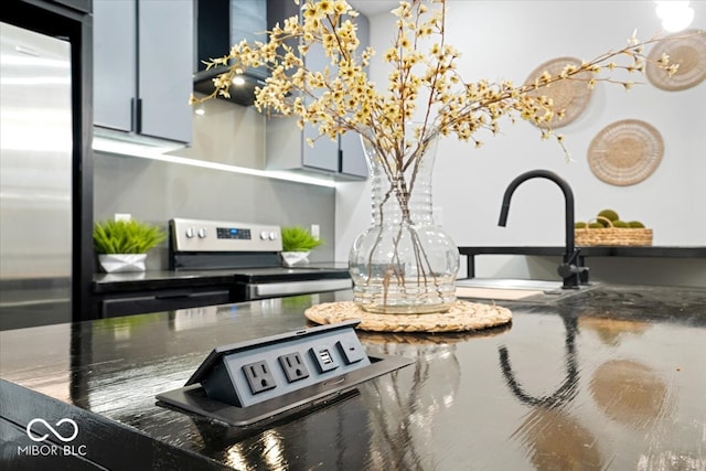 interior details with appliances with stainless steel finishes and sink