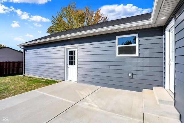 doorway to property with a patio