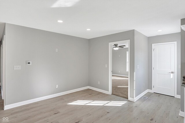 7234 N Christopher Ln, Fairland, IN 46126 - empty room featuring recessed lighting, light wood-type flooring, baseboards, and ceiling fan