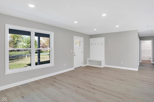 empty room with light wood-type flooring