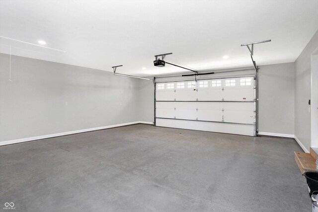 7234 N Christopher Ln, Fairland, IN 46126 - garage with recessed lighting, baseboards, and a garage door opener