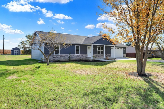 ranch-style house with a shed, a garage, and a front lawn