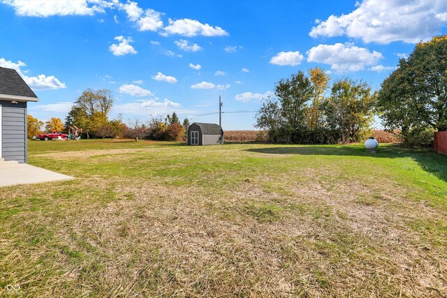 7234 N Christopher Ln, Fairland, IN 46126 - view of yard featuring an outbuilding and a shed