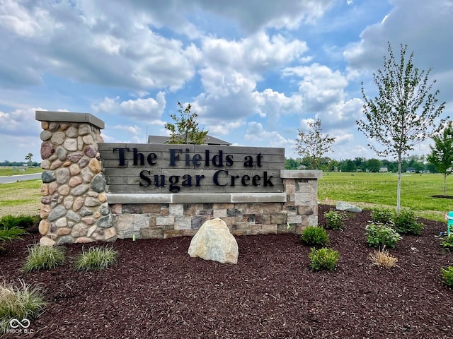 view of community sign