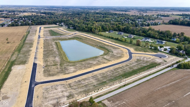 drone / aerial view with a rural view and a water view