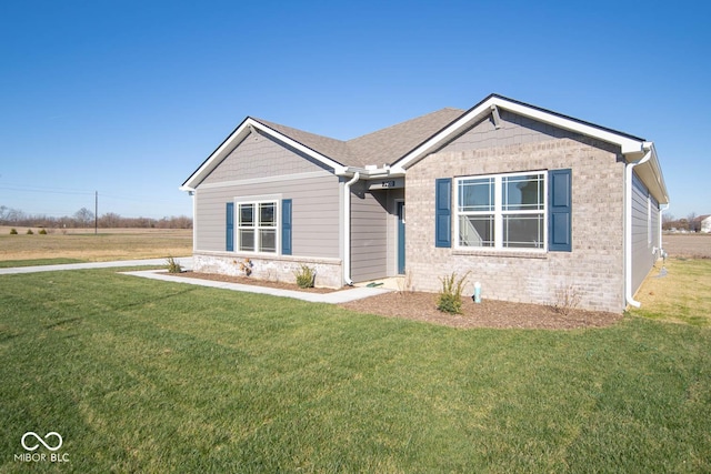 view of front of home with a front yard