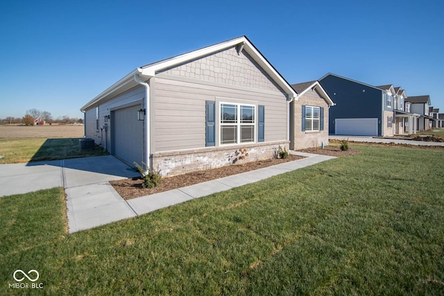 single story home featuring a front yard, central AC, and a garage