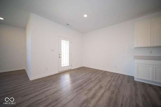 interior space featuring dark wood-type flooring