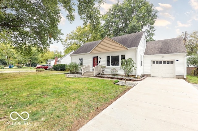 view of front of home featuring a front lawn and a garage