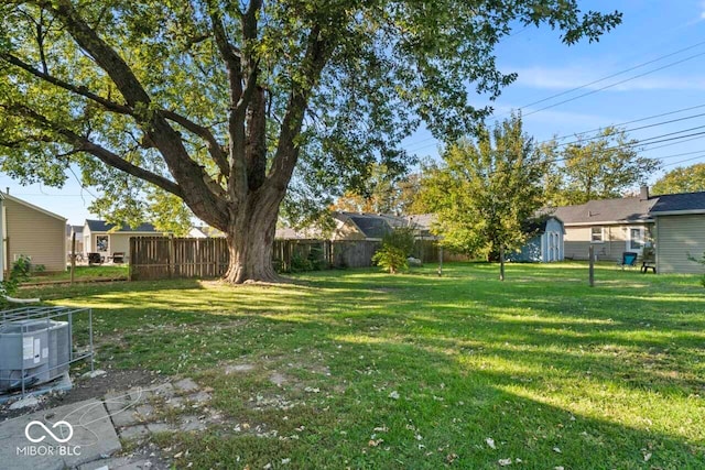 view of yard with central AC